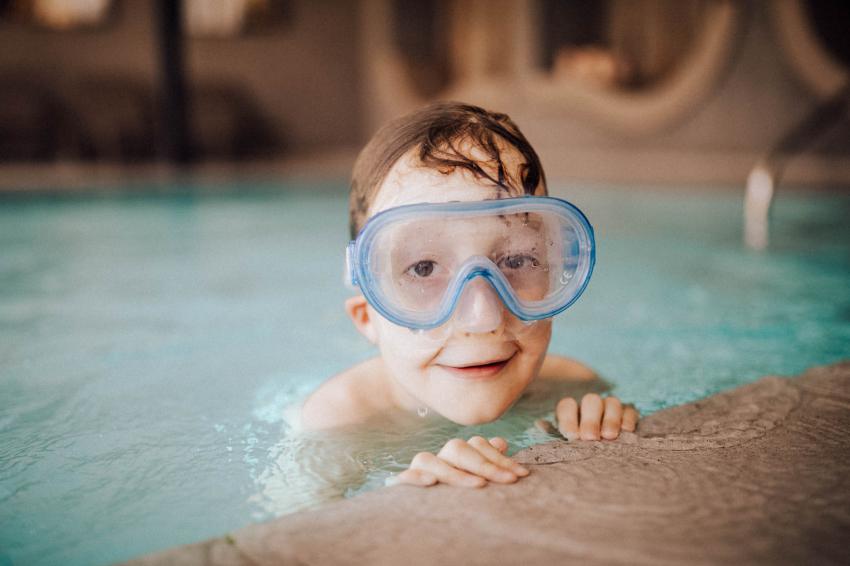 Diving in the large indoor-outdoor pool